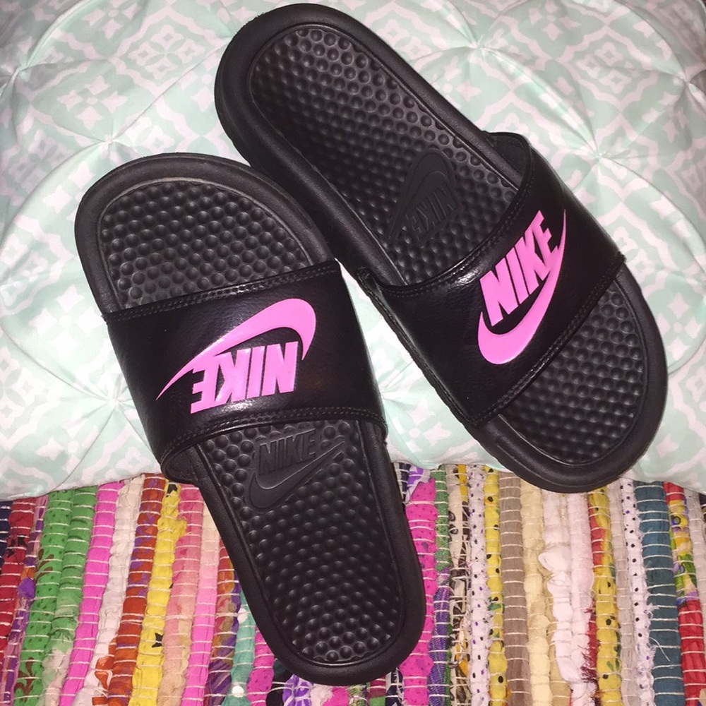 Black and pink nike slides